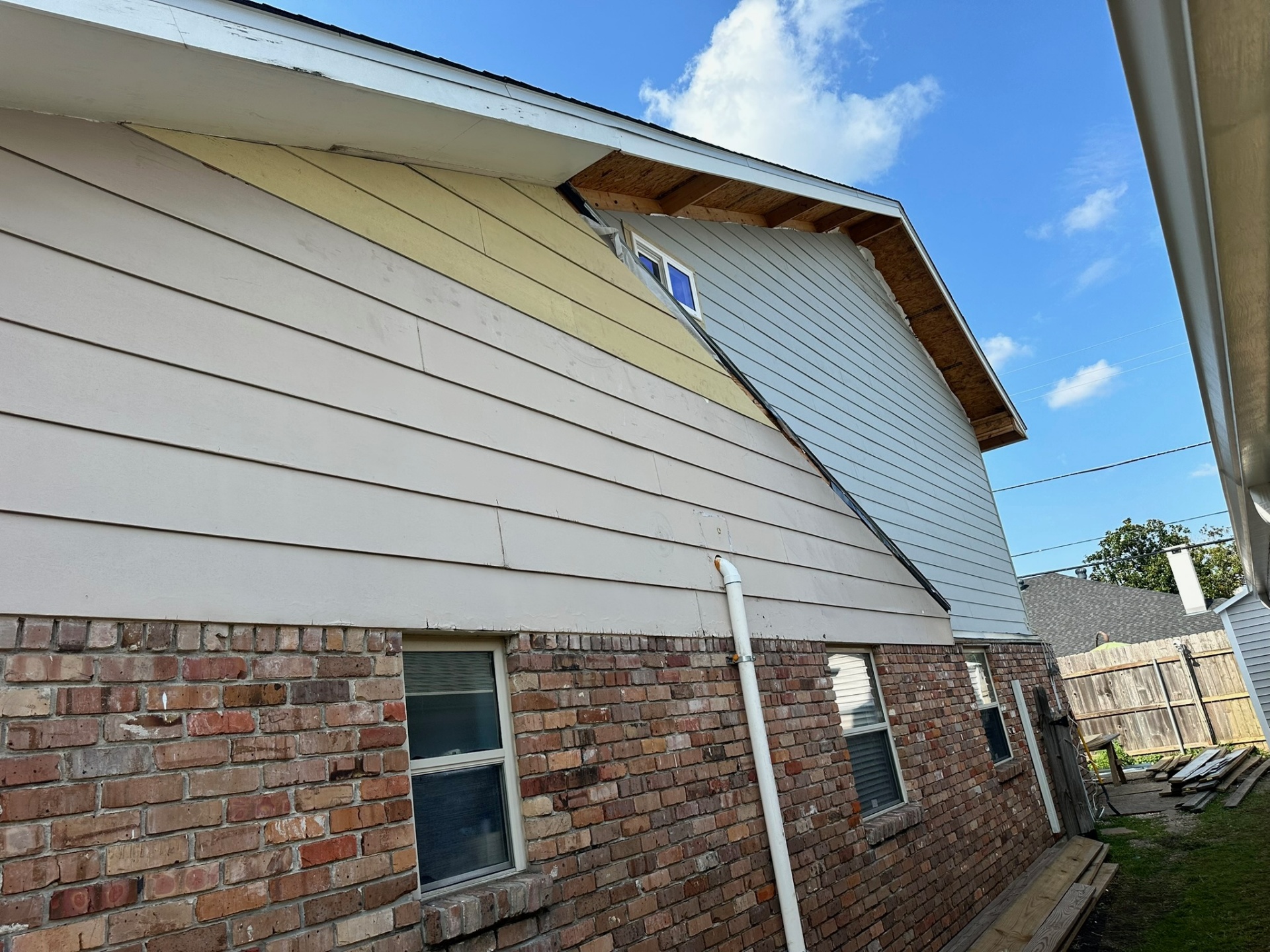 Finished exterior Hardie siding gable transition detail Metairie Louisiana