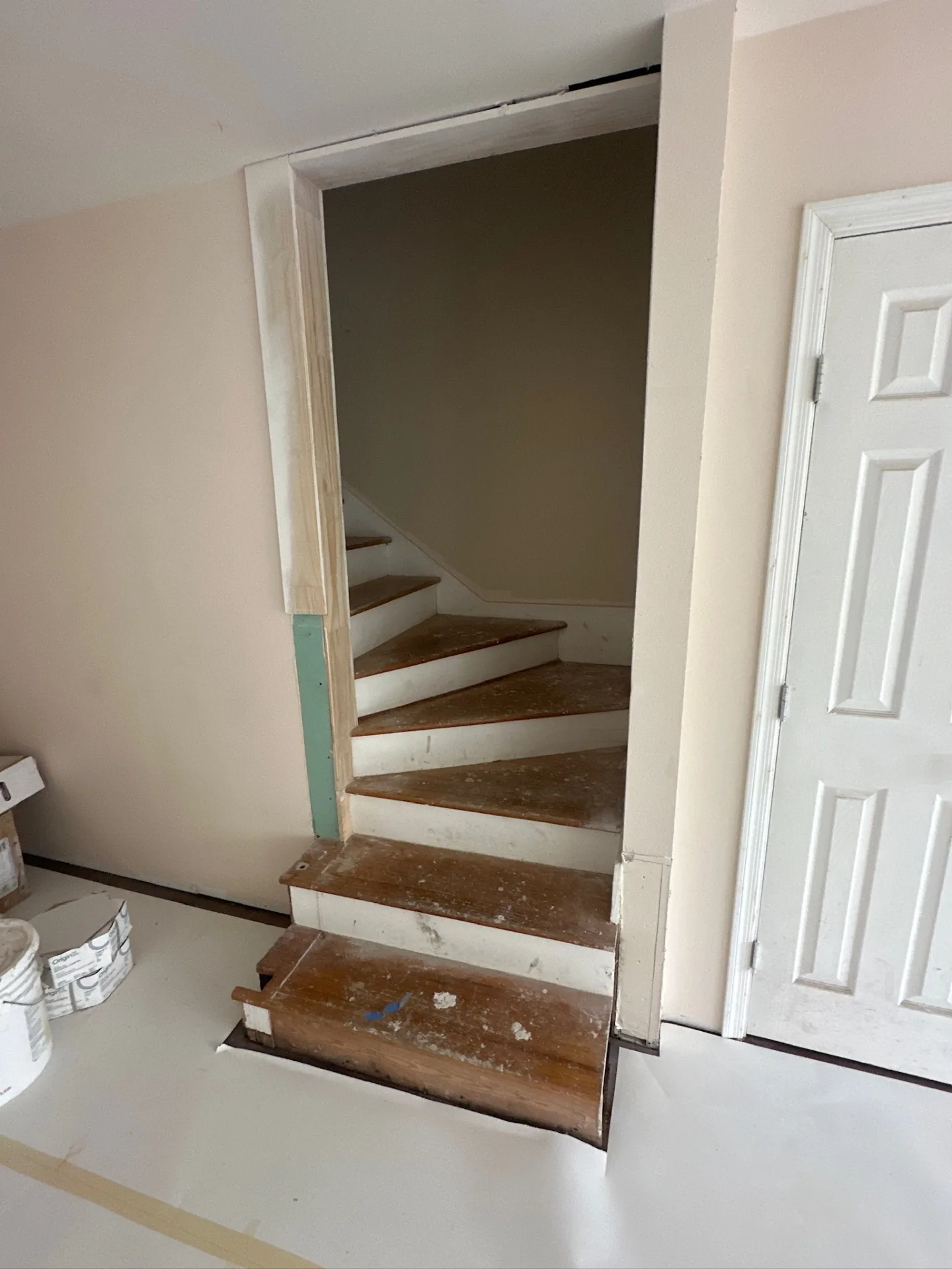 Existing wood stair opening at Blanke Street Metairie home ready for refinish, with trim and treads exposed prior to finish carpentry