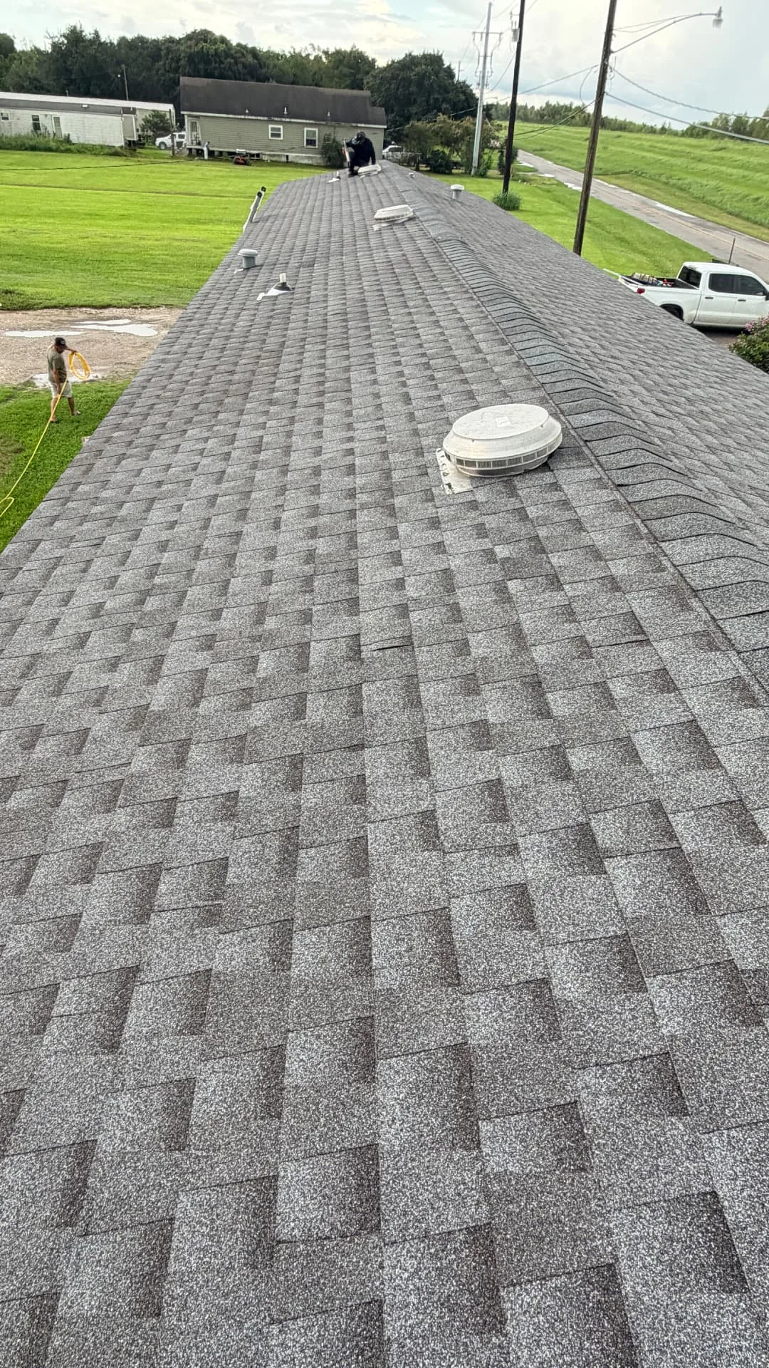 Completed GAF Timberline HDZ shingle roof with new vents and Cajun Home Services crew on a Braithwaite Louisiana home