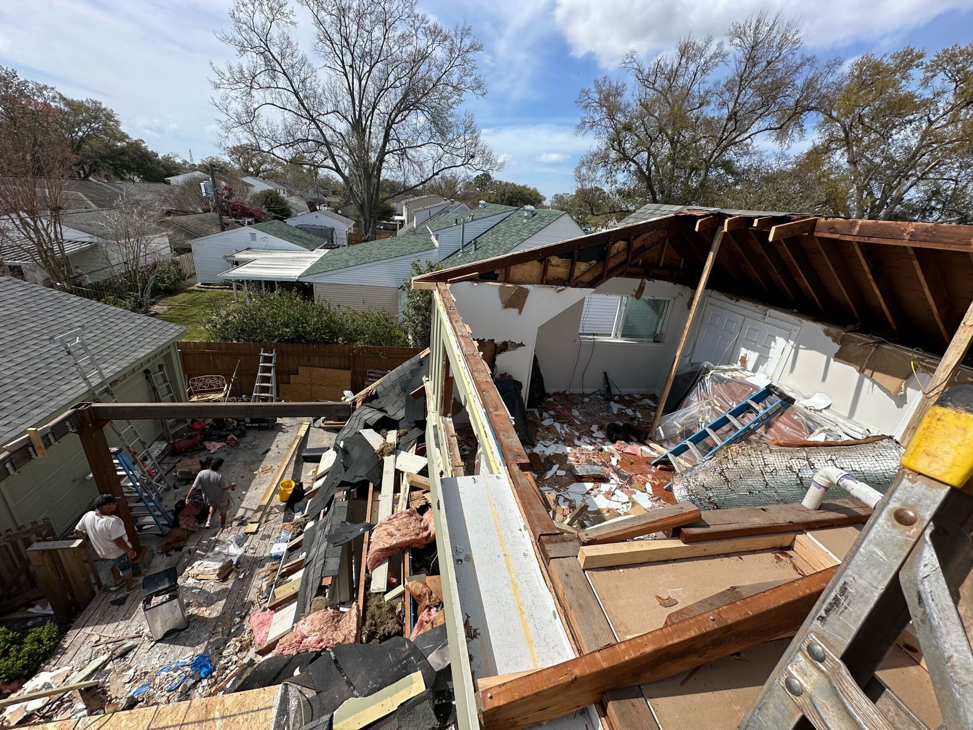 Aerial view of existing roof and second-story tear-off in progress at Blanke Street Metairie home during whole-home remodel demo phase by Cajun Home Services