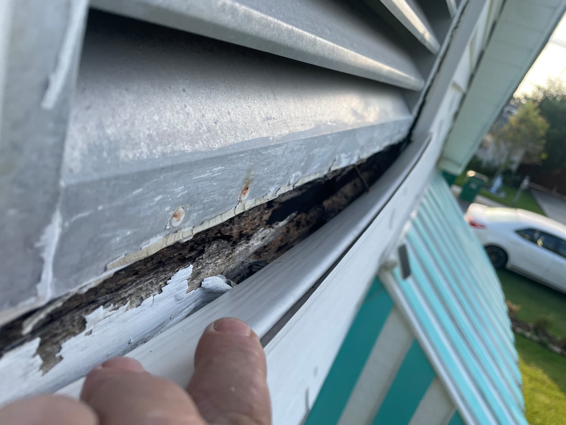 Severe wood rot around framing of the gable vent in Metairie Louisiana