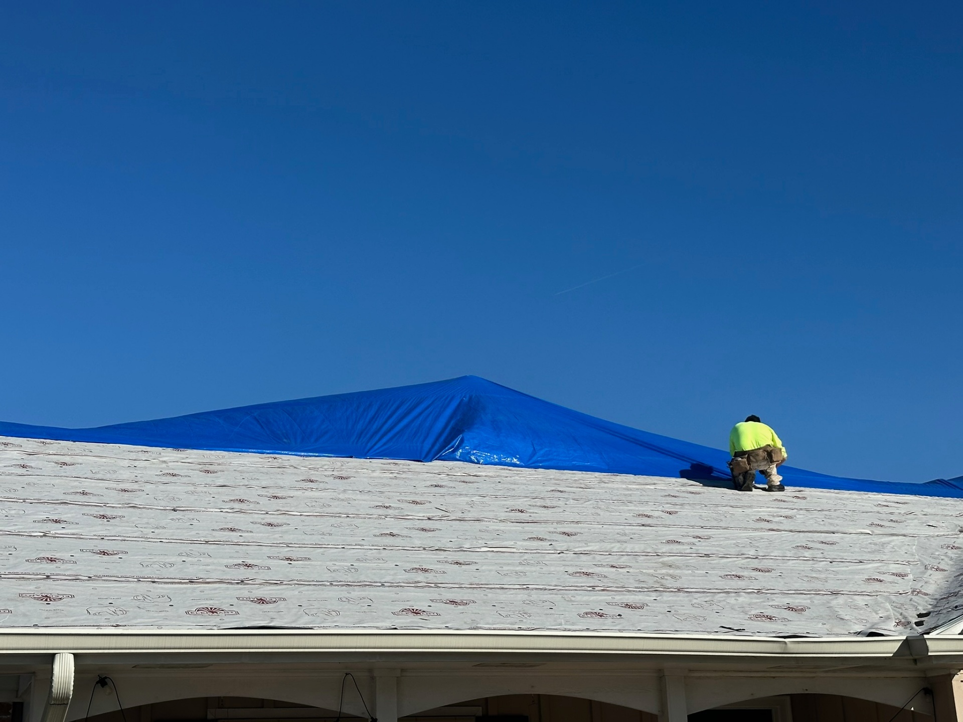 Synthetic roofing underlayment installed for dry-in on Metairie second-floor addition before shingles