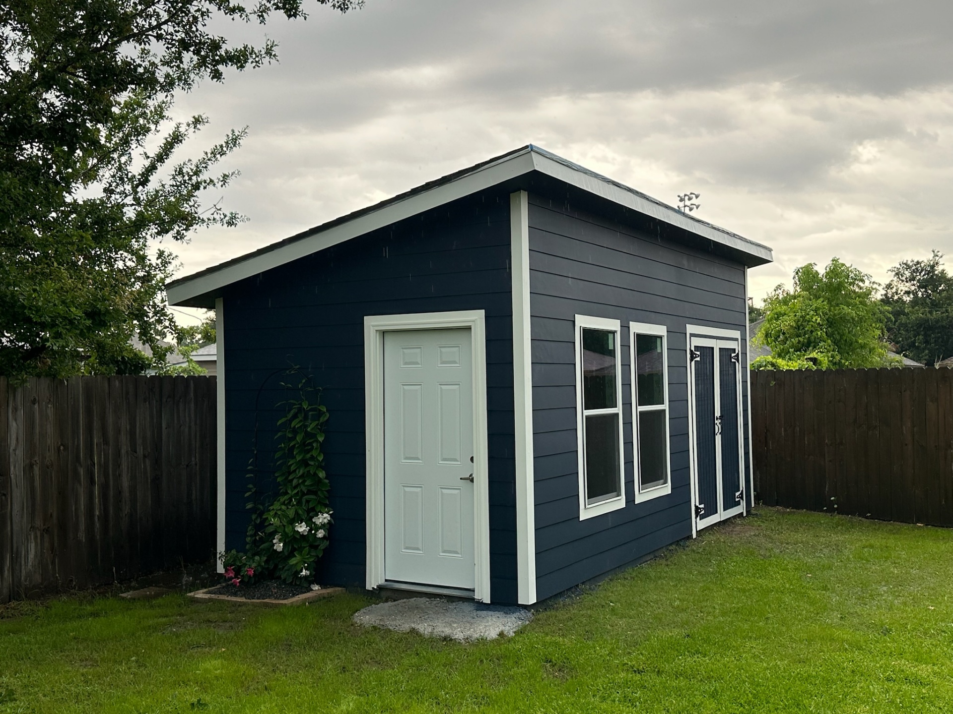 Finished side door angle on custom Hardie shed Metairie Louisiana