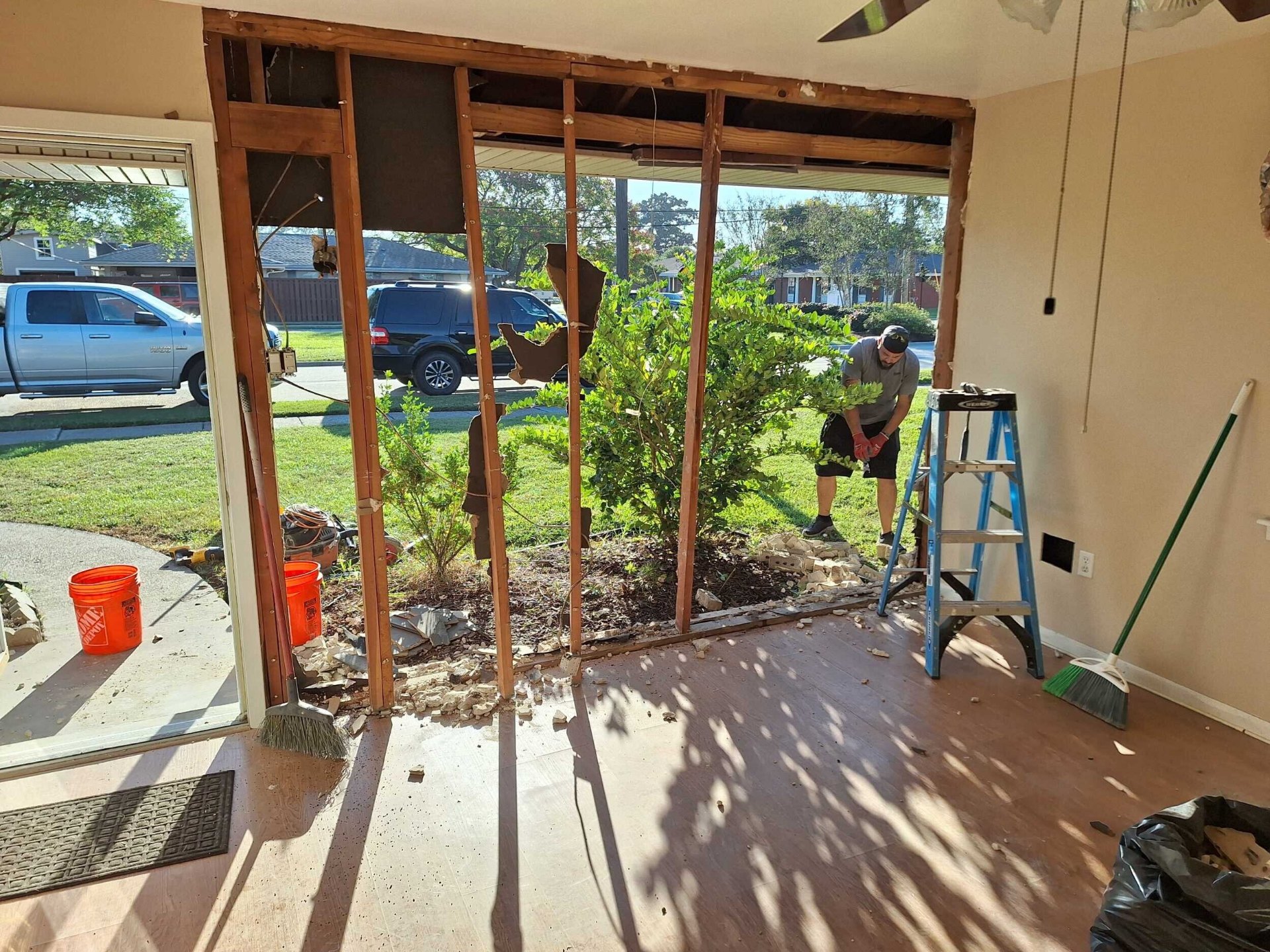 Interior of Gretna home cleared to studs with damaged wall framing exposed and prepped for structural rebuild