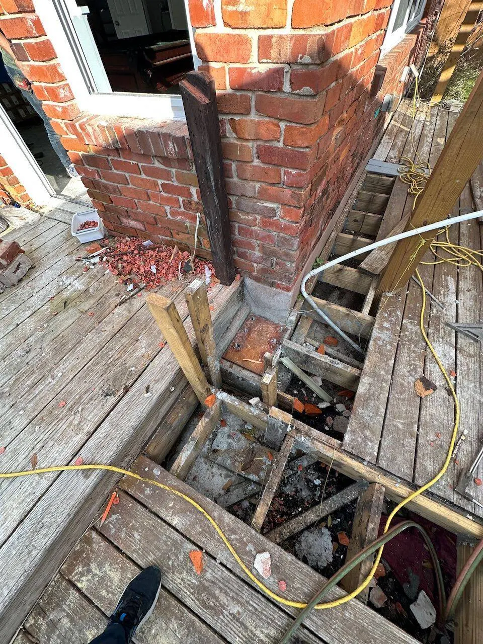 Deck and foundation structural damage exposed during repair assessment