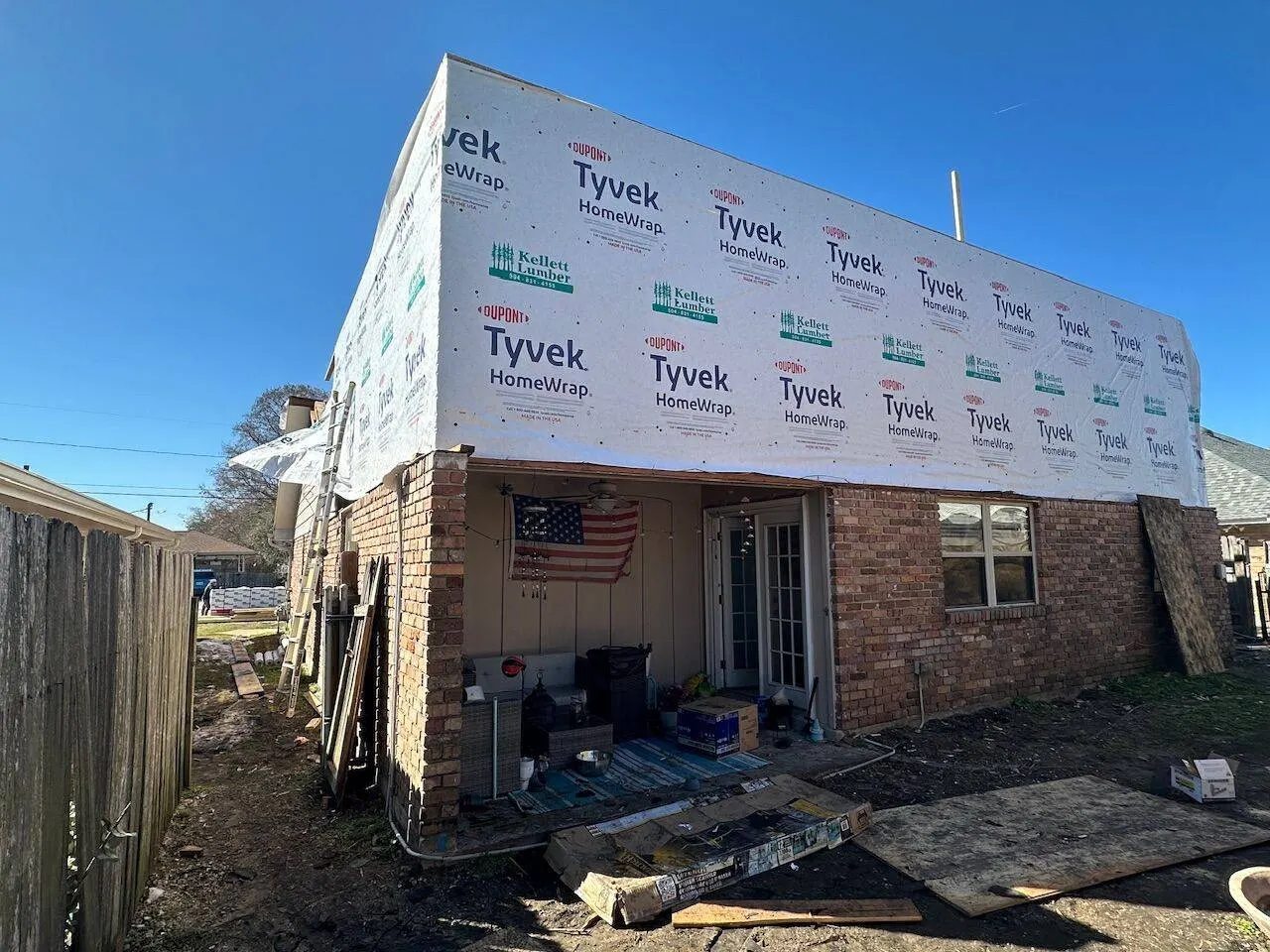 Tyvek HomeWrap on brick home during new construction second story addition in Metairie Louisiana