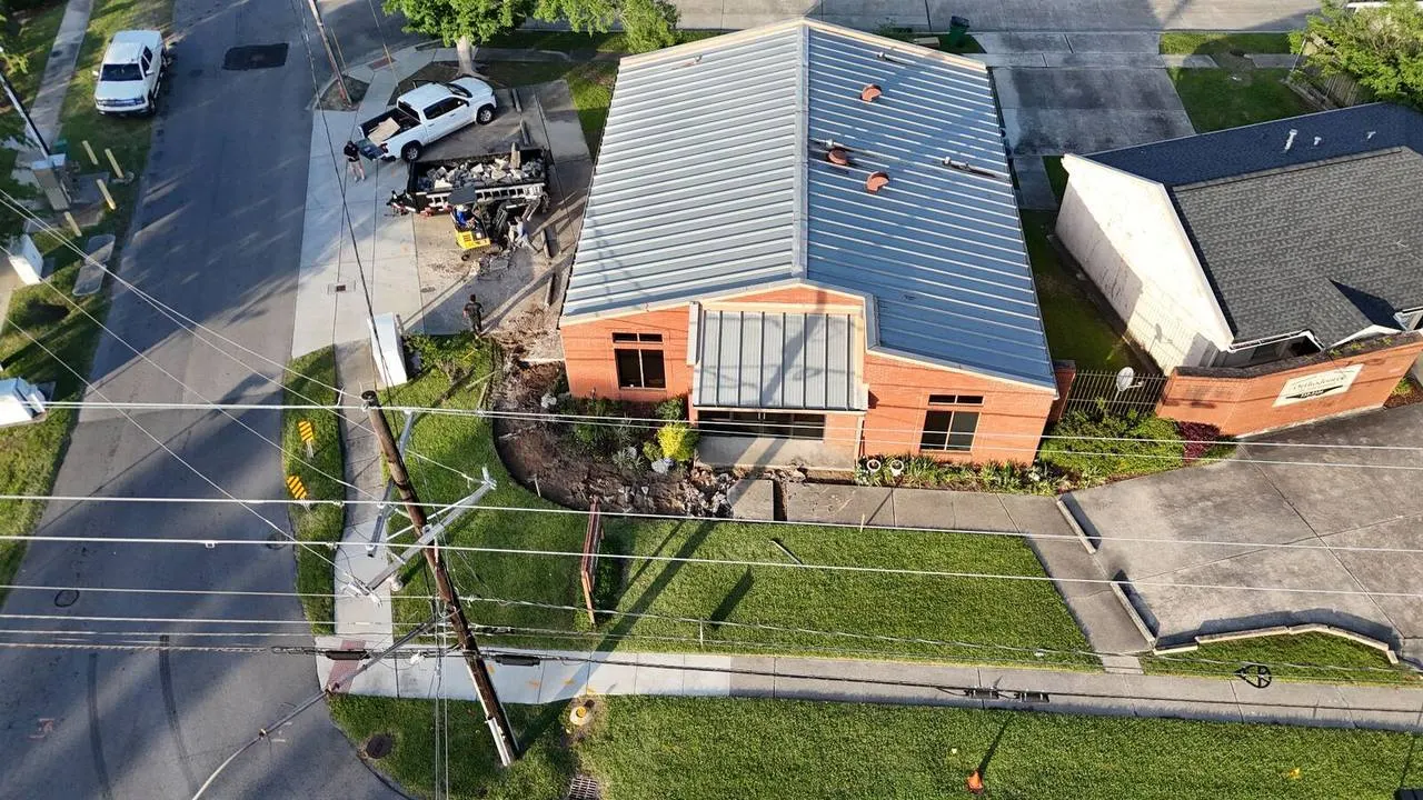 Aerial view of excavated site and root removal during Jefferson Highway sidewalk replacement project in Jefferson Parish Louisiana