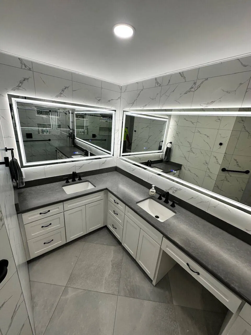 Finished LED vanity install Metairie Louisiana bathroom remodel