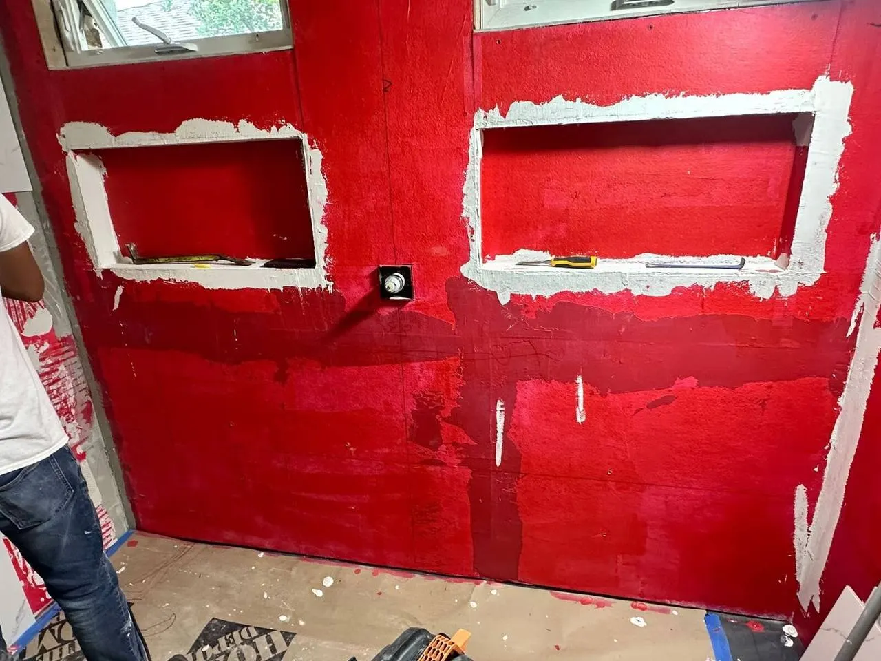 RedGard waterproofing membrane on shower walls with niches in Gretna Louisiana