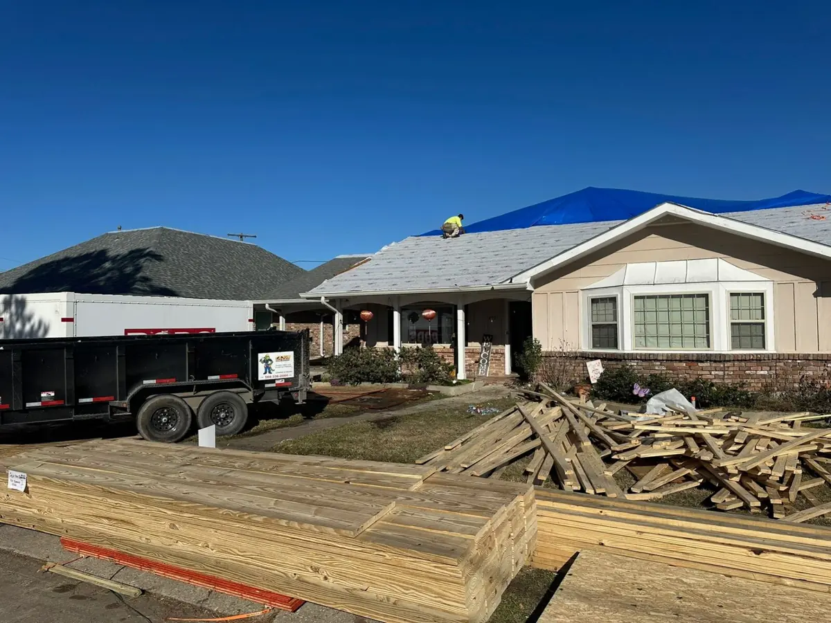 Cajun Home Services roofing crew on a residential roof replacement jobsite in Metairie Louisiana