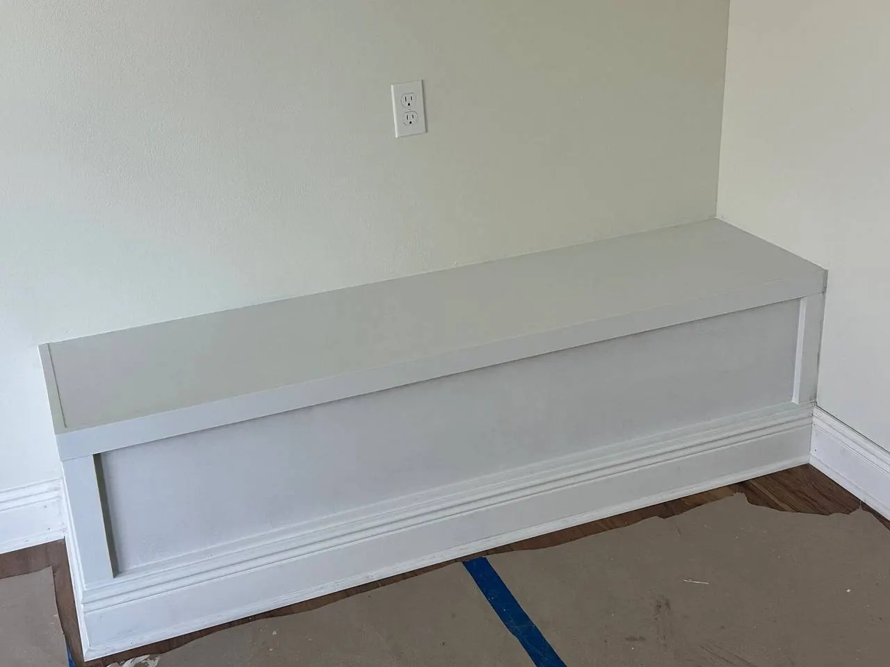 Custom built-in bench with trim work in Metairie master bedroom addition