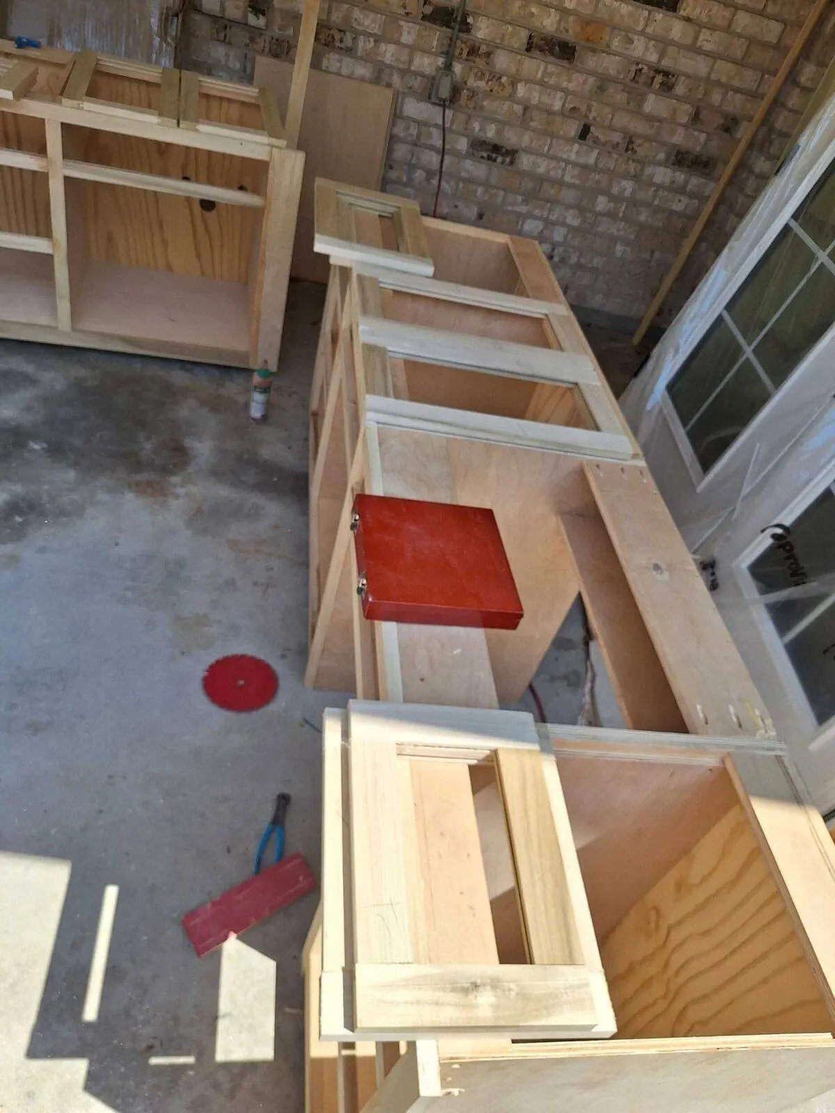 Custom kitchen cabinets built in workshop with plywood and solid wood face frames