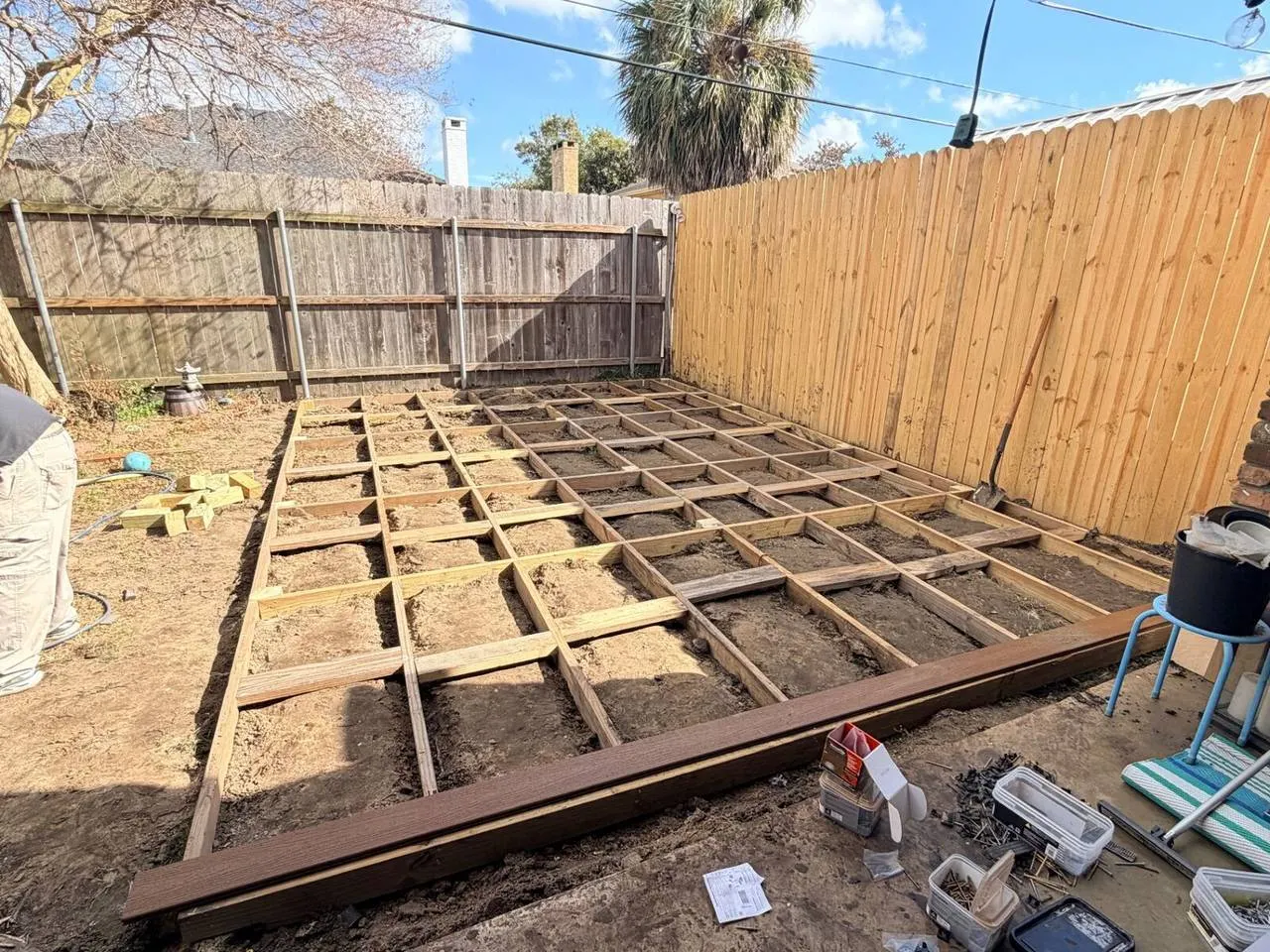 Deck joist framing with composite trim board installation in Metairie