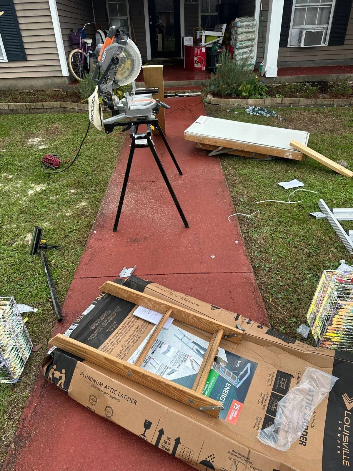 Attic ladder materials and prep work at Destrehan home in St. Charles Parish