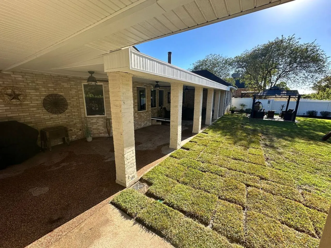 Patio cover with new siding and columns in Destrehan Louisiana