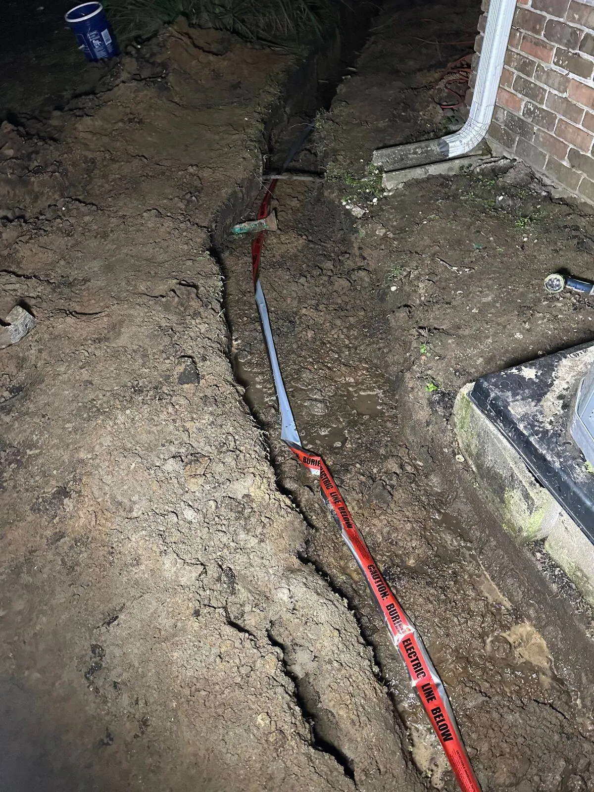 Underground electrical line installation for Metairie home addition project