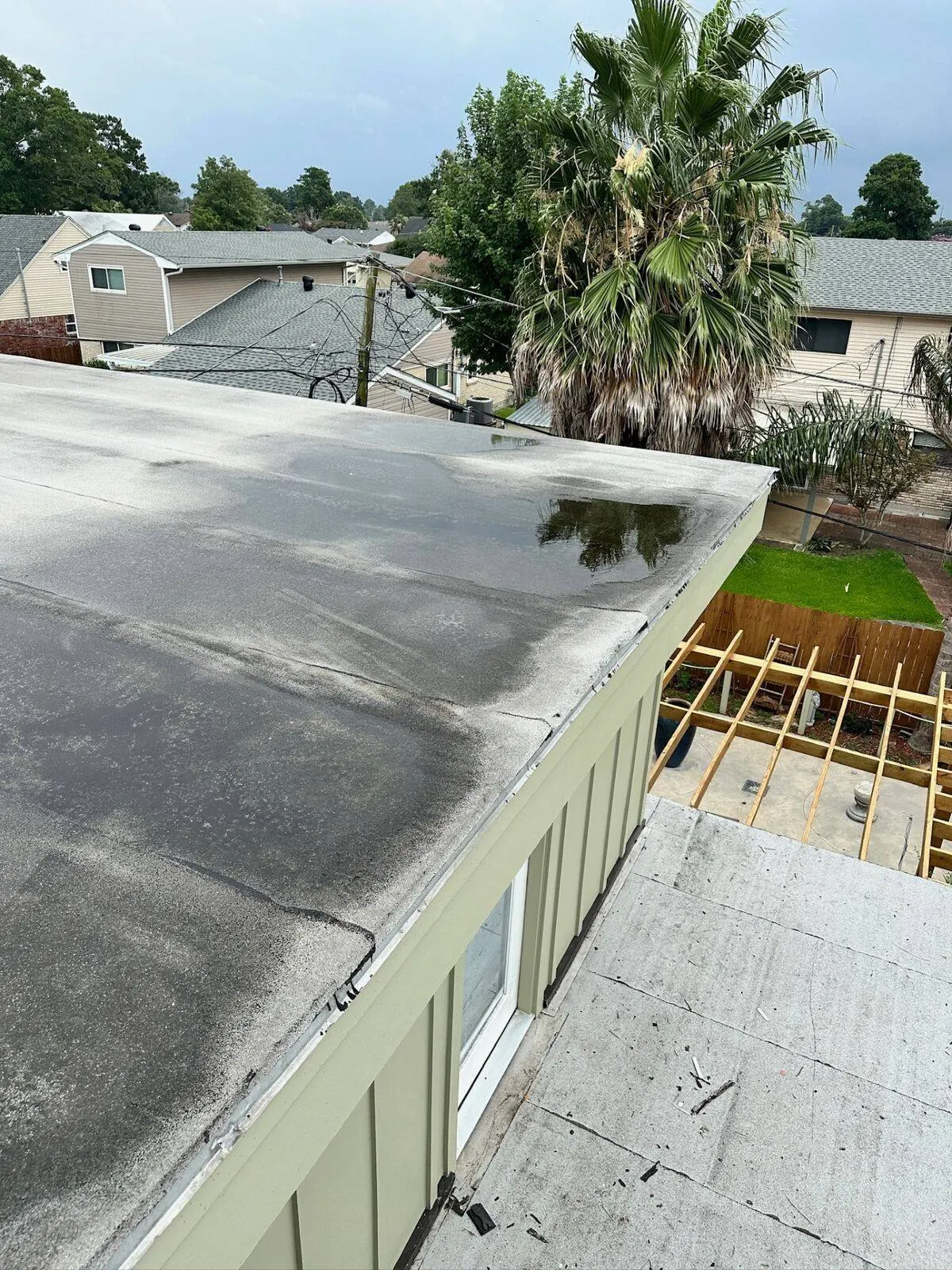 Flat roof installation with new framing by Cajun Home Services in Louisiana