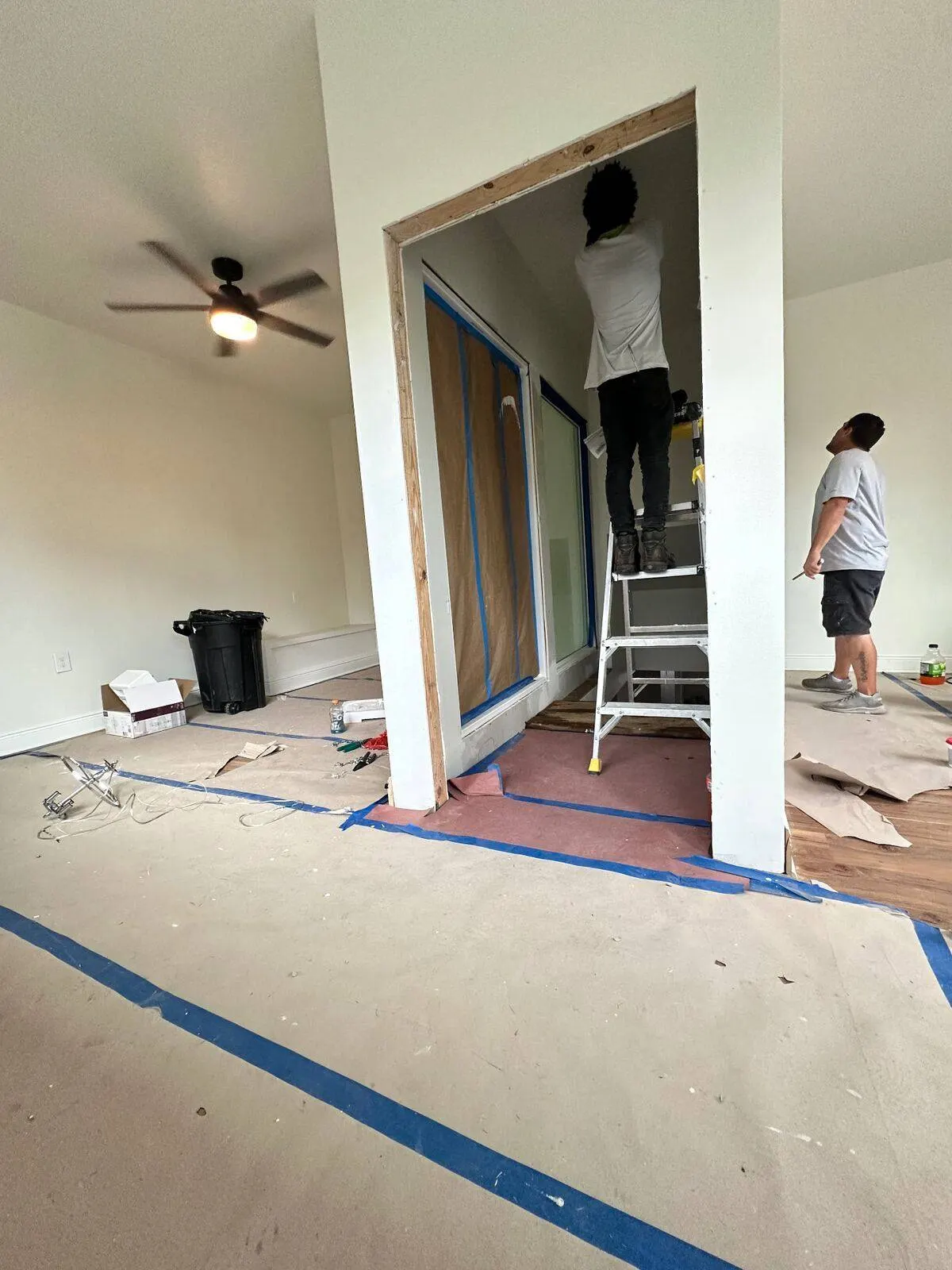 Grand glass entrance door installation for stairwell in Metairie second floor addition