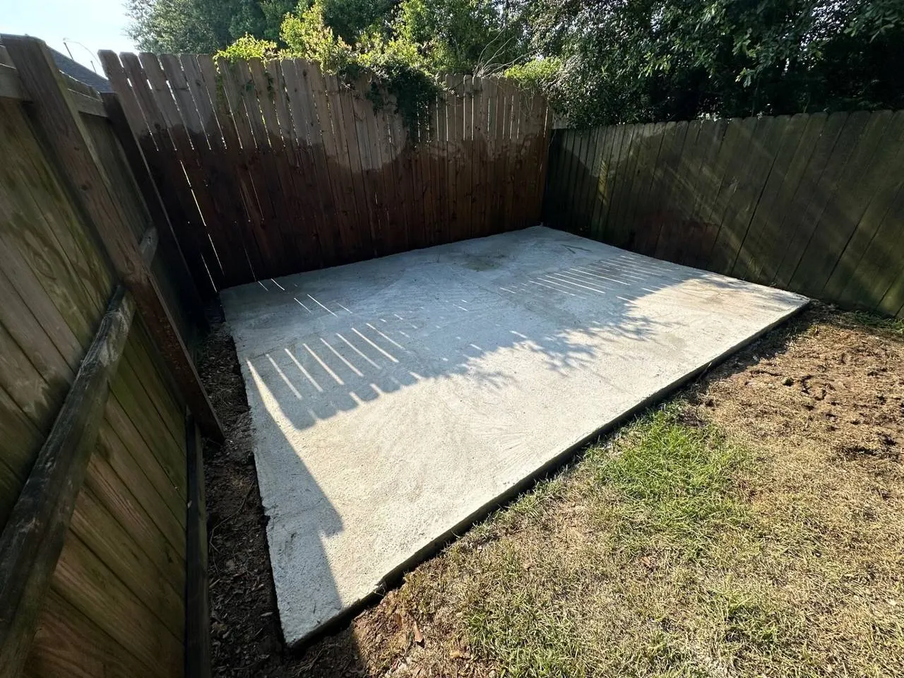 Completed concrete slab foundation from corner angle showing quality finish in Hammond Louisiana