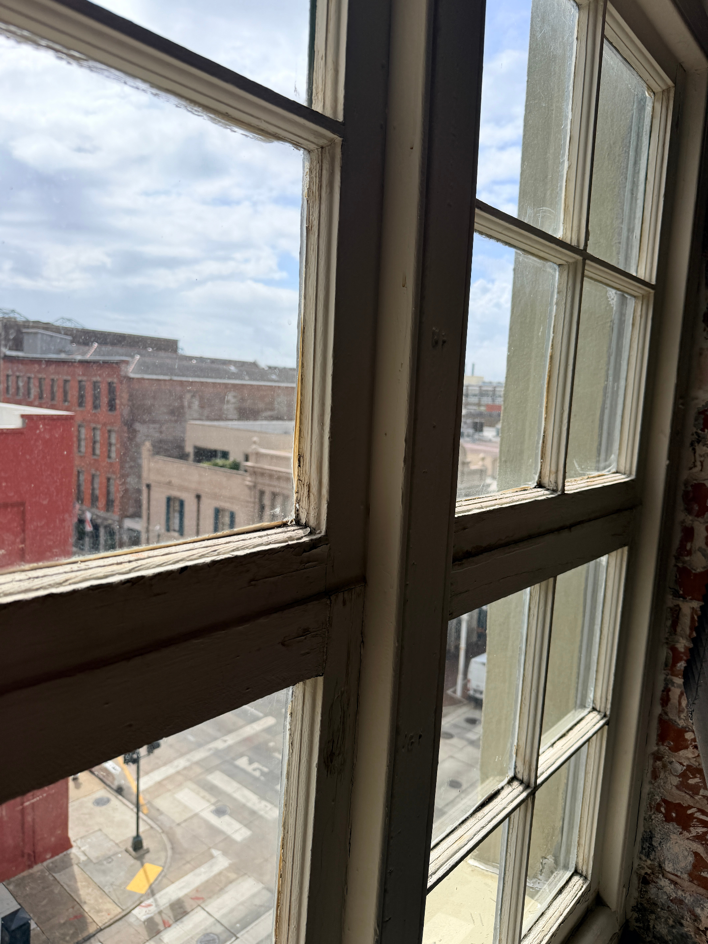 Side angle of deteriorated historic window before restoration in the Arts District
