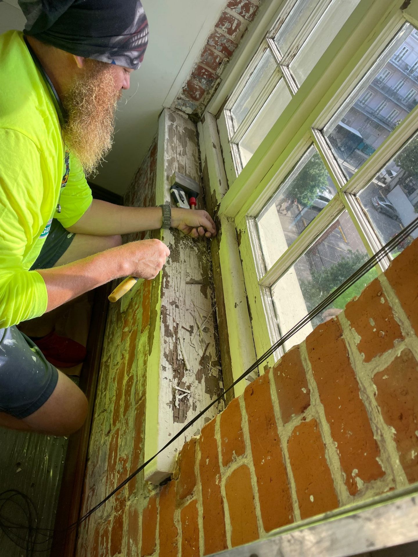 Close preparation stage of divided-light historic wood window restoration