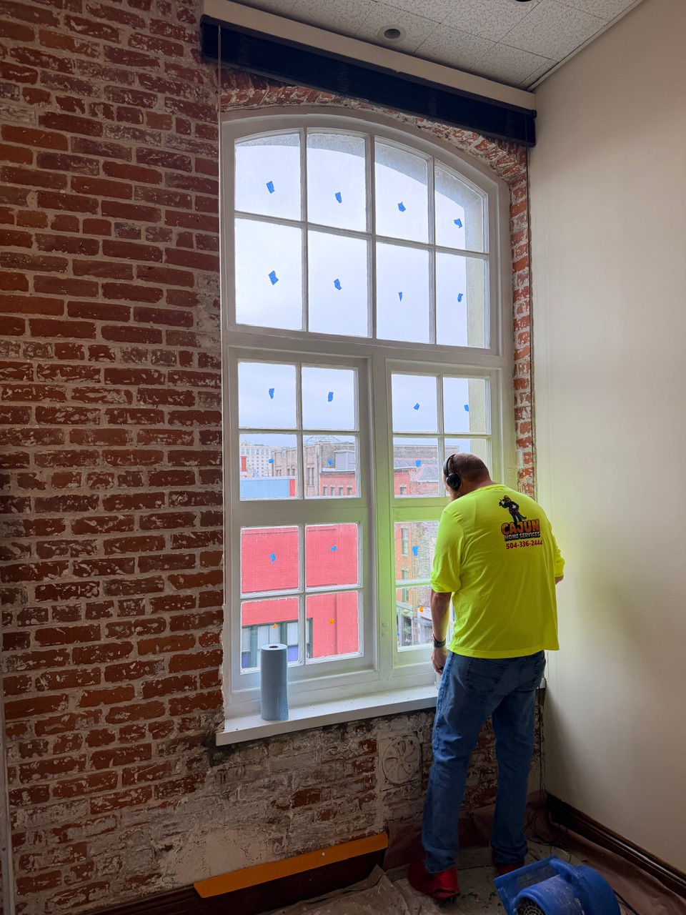 Wood window repair process with glazing work underway in the Arts District