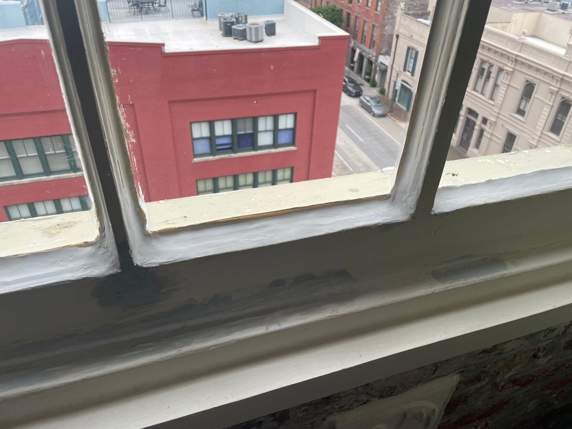 Painting stage for restored historic wood window in the CBD Arts District