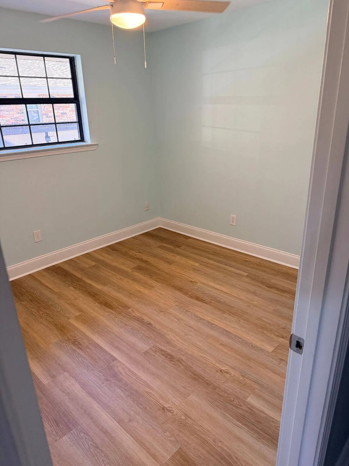 LVP flooring in bedroom Metairie Louisiana