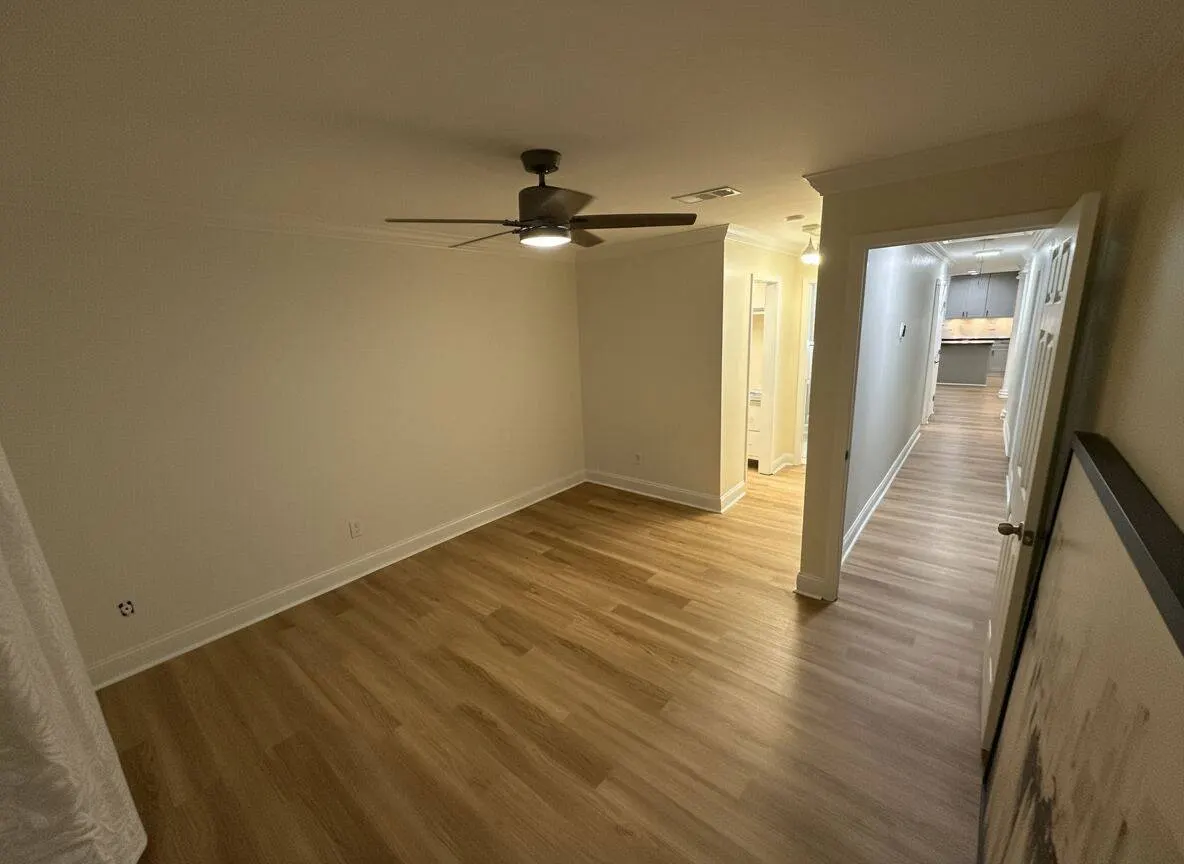 Luxury vinyl plank flooring installation in bedroom and hallway in Metairie LA
