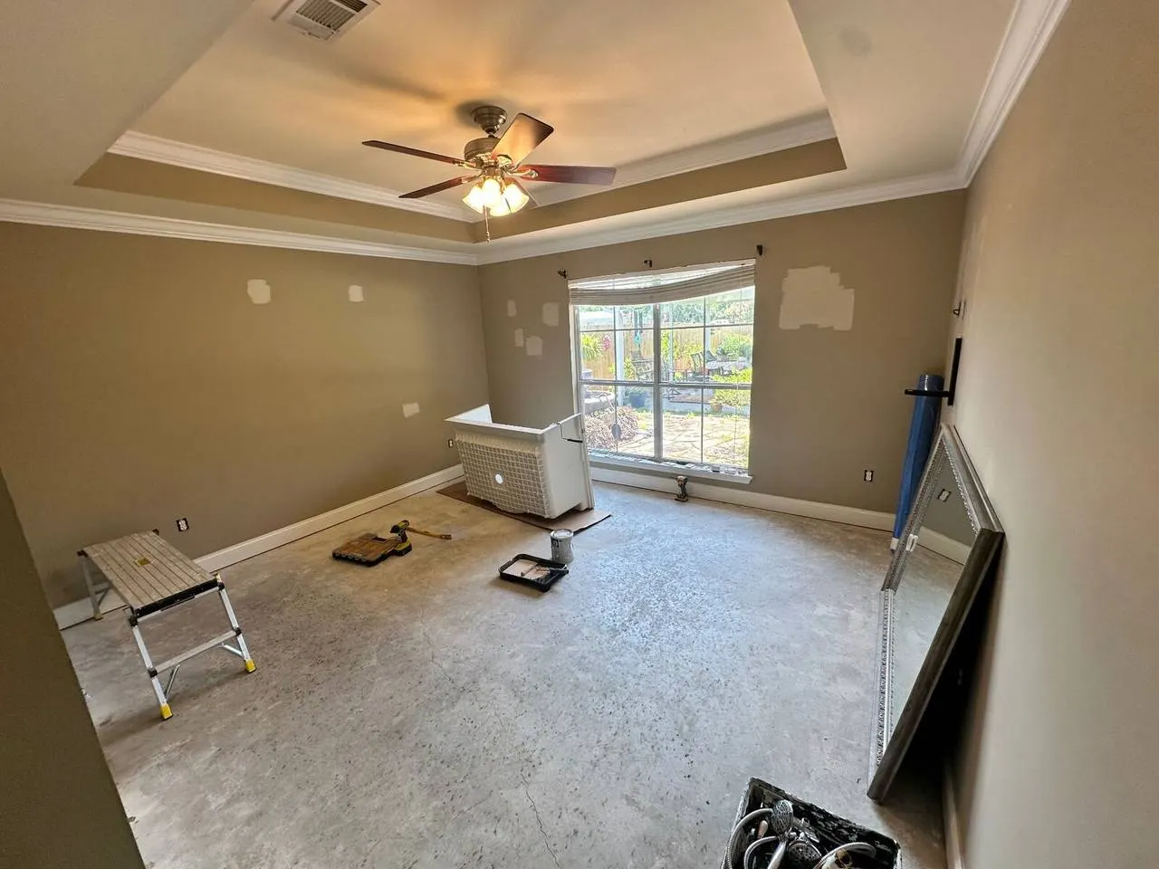 Master bedroom prepared for flooring in Gonzales renovation