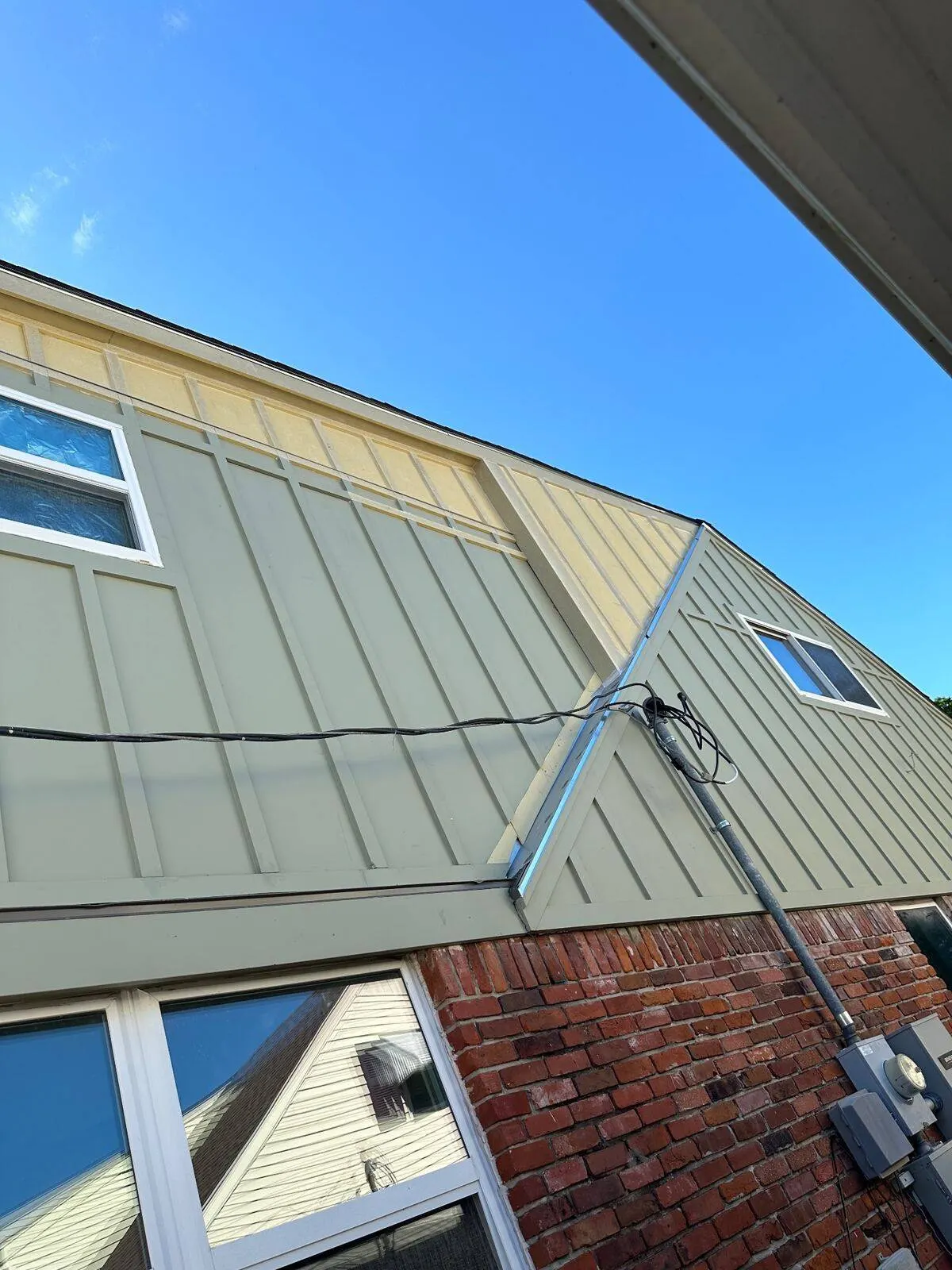 Roofing materials delivered and staged on jobsite by Cajun Home Services