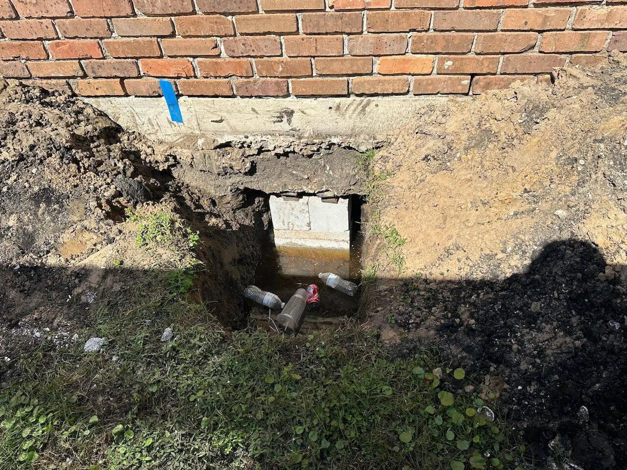 Concrete block pier installation under slab foundation for repair in Kenner Louisiana