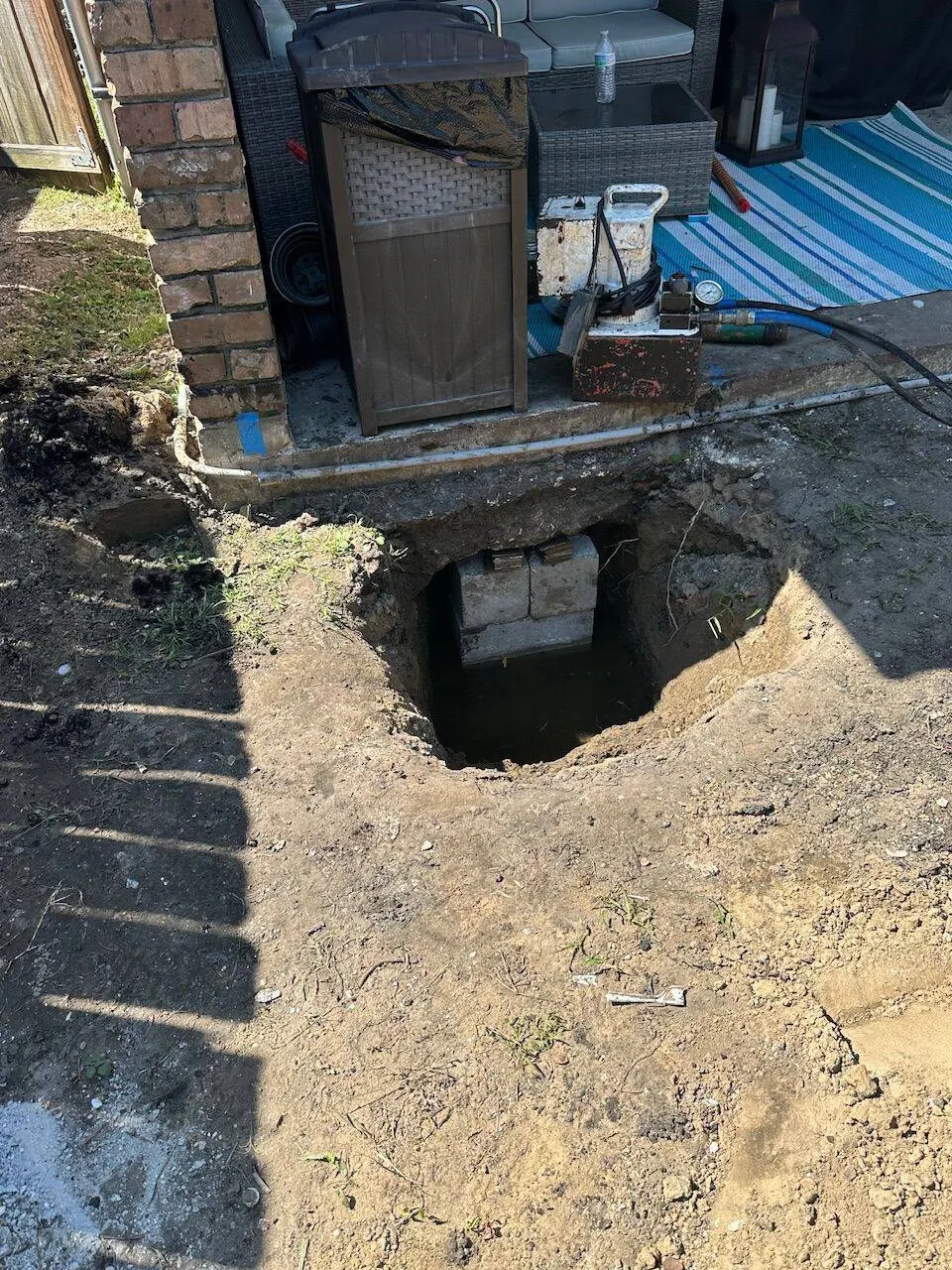 Foundation pier support work in progress at residential home in New Orleans