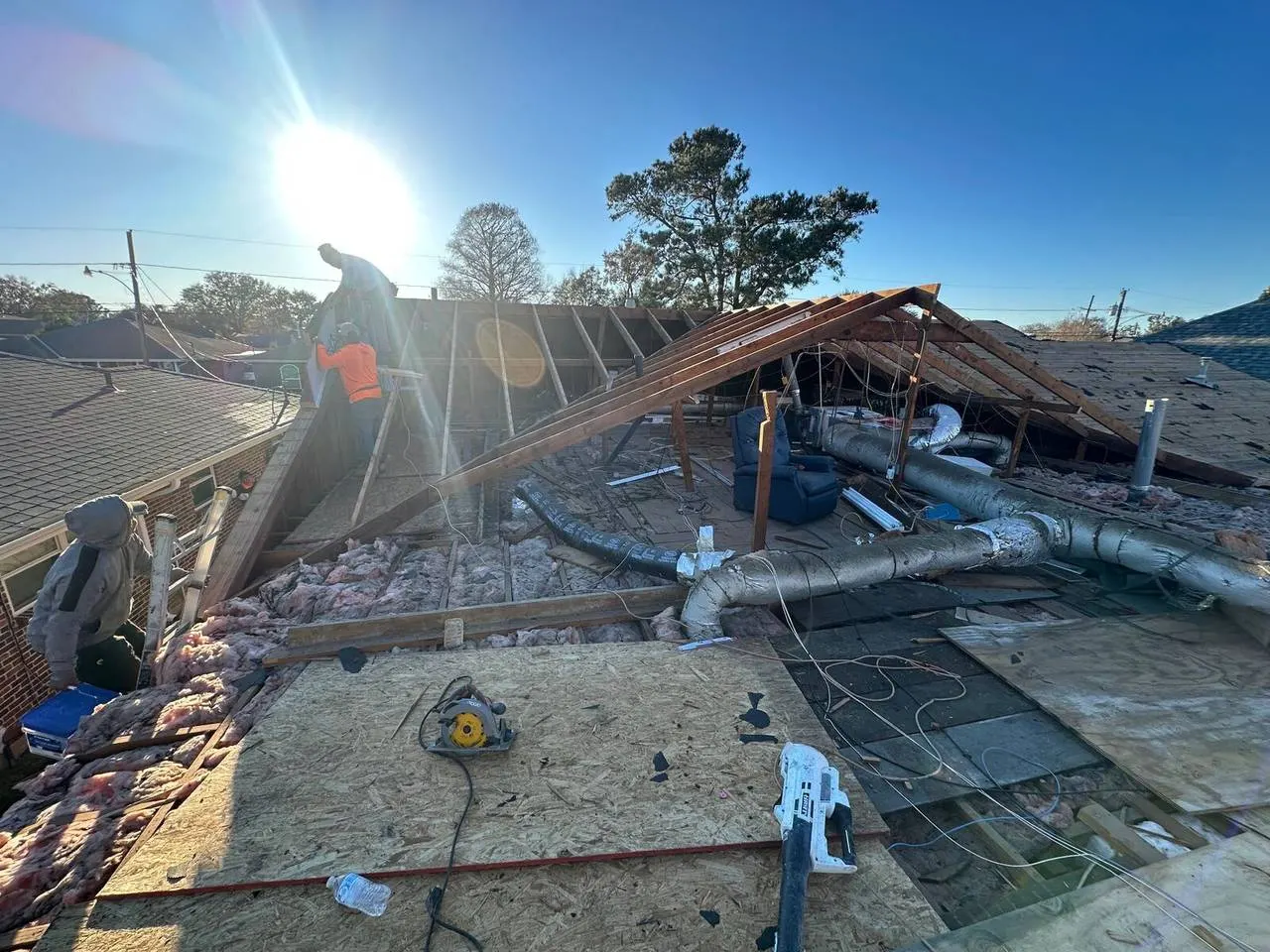 Roof framing progress on new addition by Cajun Home Services
