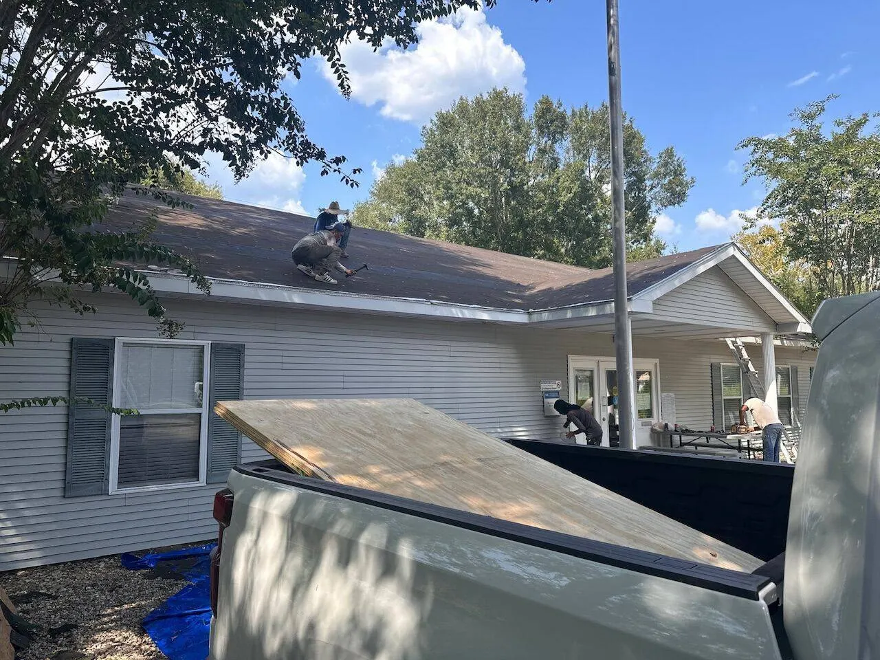 Cajun Home Services crew working on residential roof replacement in Southeast Louisiana