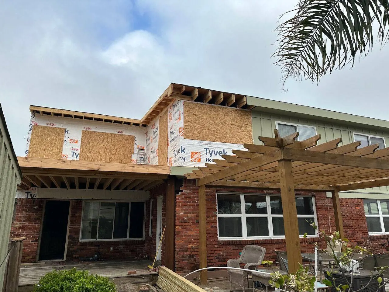 Second-story addition with completed exterior siding in Southeast Louisiana