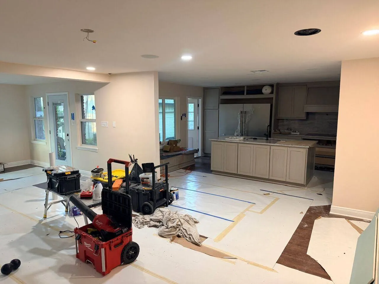 Whole home remodel in progress with kitchen cabinetry and flooring preparation in Kenner Louisiana